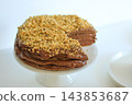 Homemade chocolate cake with nuts served on a plate close up 143853687