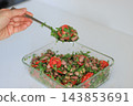 Fresh bean and tomato salad being prepared 143853691