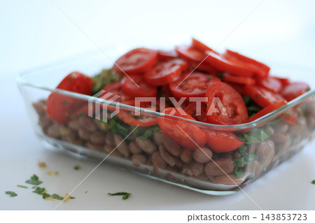 Close up of homemade bean and tomato salad Close up of homemade bean and tomato salad 143853723