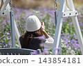 Nakanojo Gardens - Swing in the Flower Garden 143854181