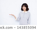 A woman giving an introduction 143855094