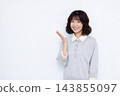 A woman giving an introduction 143855097
