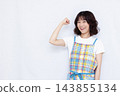 A housewife doing a fist pump 143855134