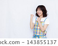 A housewife doing a fist pump 143855137