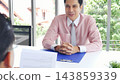 Job Interview with headhunter agent and applicant. Job HR applicants having an interview with Human resource manager jobs interviewing with confident candidate at business firm office give cv resume 143859339