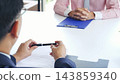 Job Interview with headhunter agent and applicant. Job HR applicants having an interview with Human resource manager jobs interviewing with confident candidate at business firm office give cv resume 143859340