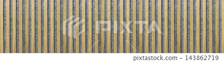 Panoramic acoustic wall paneling featuring vertical light oak wooden slats mounted on gray felt Panoramic acoustic wall paneling featuring vertical light oak wooden slats mounted on gray felt 143862719