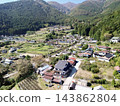 Terraced rice fields in Hirabayashi, Fujikawa Town, Yamanashi Prefecture, with a view of Mt. Fuji: Autumn rural landscape 143862804