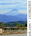 Terraced rice fields in Hirabayashi, Fujikawa Town, Yamanashi Prefecture, with a view of Mt. Fuji: Autumn rural landscape 143862805