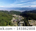 Terraced rice fields in Hirabayashi, Fujikawa Town, Yamanashi Prefecture, with a view of Mt. Fuji: Autumn rural landscape 143862808
