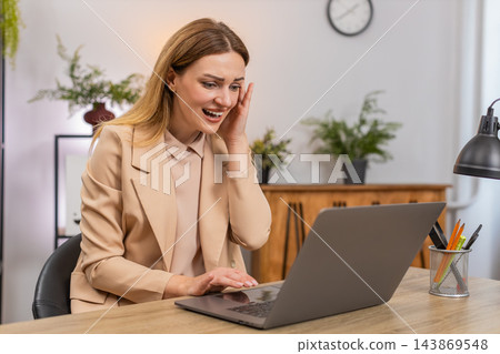 Businesswoman faces laptop system crash data loss holds head facepalm error pops up failure reaction 143869548