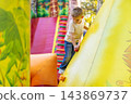Young boy climbing inflatable wall at outdoor playground 143869737
