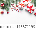 Christmas gifts, candy canes and ornaments on white 143871195