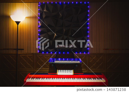 red piano on modern contemporary design studio background red piano on modern contemporary design studio background 143871238