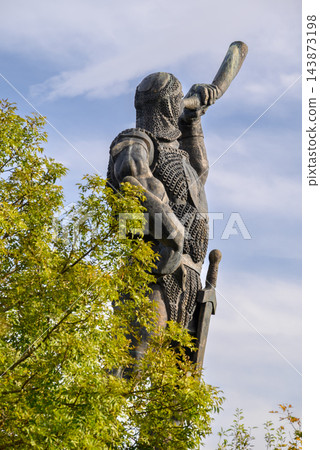 Trumpeter Warrior monumental sculpture located near the Didgori Battle Memorial in Georgia Trumpeter Warrior monumental sculpture located near the Didgori Battle Memorial in Georgia 143873198