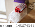 Blood collection containers neatly positioned for diagnostic procedures in laboratory setting 143874341