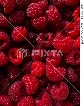 Bright red ripe raspberry berries texture background Bright red ripe raspberry berries texture background 143876894