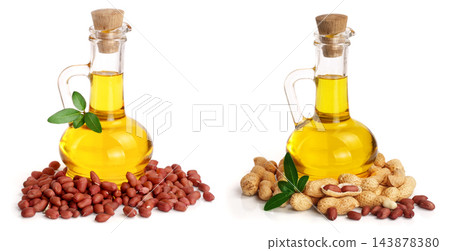 peanut oil in a glass bottle with peanuts peanut oil in a glass bottle with peanuts 143878380