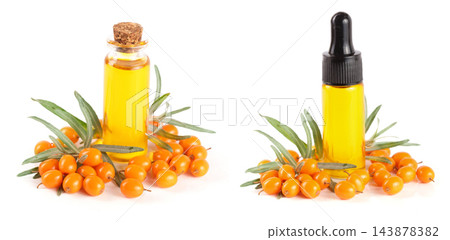 Sea-buckthorn oil with berries and leaves isolated on white background 143878382