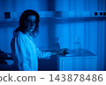 Female powers up electronic tool. Lady activates small electronic gadget effortlessly. Woman purposefully switches on compact electronic device to begin operation 143878486