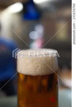 Cold Beer Served in a Glass Mug with Golden Color and Foam Cold Beer Served in a Glass Mug with Golden Color and Foam 143878789