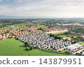 Aerial housing estates and rice fields in San Na Meng, San Sai, Chiang Mai, Thailand 143879951