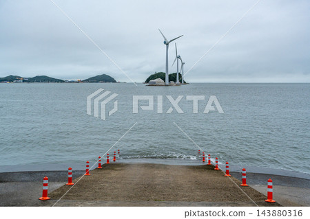 Coastal Boat Ramp Facing Three Wind Turbines Coastal Boat Ramp Facing Three Wind Turbines 143880316