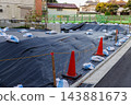住宅建築工地以黑色防護布覆蓋。 住宅建築工地以黑色防護布覆蓋。 143881673