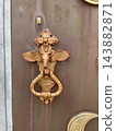 Traditional church heavy wooden entrance doors and decorative fittings 143882871