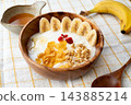 Breakfast with banana and yogurt 143885214