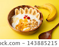 Yellow background and banana yogurt 143885215