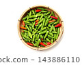 Fresh bird's eye chilies on white background. 143886110