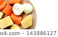 Chopped fresh vegetables including carrots, potatoes, and onions 143886127
