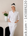 Professional Woman Physician Posing in Stylish Office 143889220