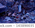 Corner of an old,ruined house with brick rubble, in darkness of night 143890035