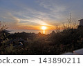 Sun setting over the rocky coast of Costa Paradiso in Sardinia 143890211
