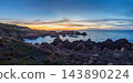 Wide panorama of the granite coastline at sunset in Costa Paradiso 143890224