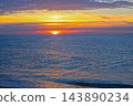 Brilliant sunset glowing on the sea horizon at Badesi Sardinia 143890234