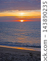 Vertical beach sunset with orange reflections at Badesi Sardinia 143890235