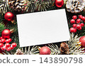 Blank christmas greeting card framed by festive evergreen decorations 143890798