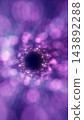 Abstract purple particle tunnel surrounded by soft glowing bokeh, creating a dreamy sense of depth, motion, and passage into darkness. 143892288
