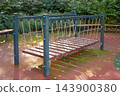 Playground bridge supports balance play in an empty outdoor park 143900380
