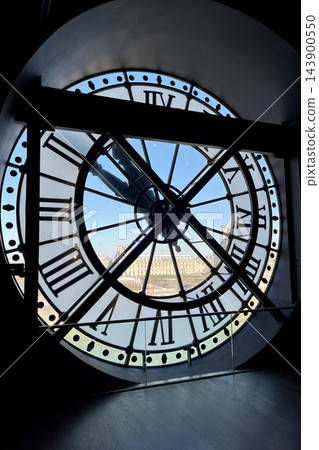 Iconic giant clock inside Musee d Orsay in Paris with Roman numerals and a view of the city through the transparent clock face. High quality photo Iconic giant clock inside Musee d Orsay in Paris with Roman numerals and a view of the city through the transparent clock face. High quality photo 143900550