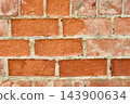 Red weathered brick wall texture with concrete mortar 143900634