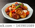Chicken and vegetables stir-fried in black vinegar Chicken and vegetables stir-fried in black vinegar 143901089
