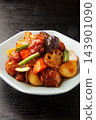 Chicken and vegetables stir-fried in black vinegar Chicken and vegetables stir-fried in black vinegar 143901090