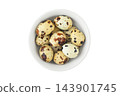 Quail eggs in a ceramic bowl, isolated on a white background. Dietary and highly nutritious product. Top view. 143901745