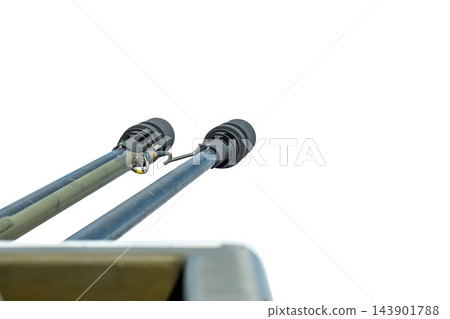 Twin naval gun barrels isolated against white background from low angle Twin naval gun barrels isolated against white background from low angle 143901788