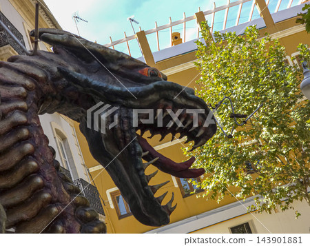 Close Up of Large Fierce Dragon Head Sculpture in Historic Town Close Up of Large Fierce Dragon Head Sculpture in Historic Town 143901881