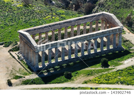 Aerial view of Segesta Doric temple with 36 columns. Ancient Greek temple ruins in Sicily archaeological park 143902746